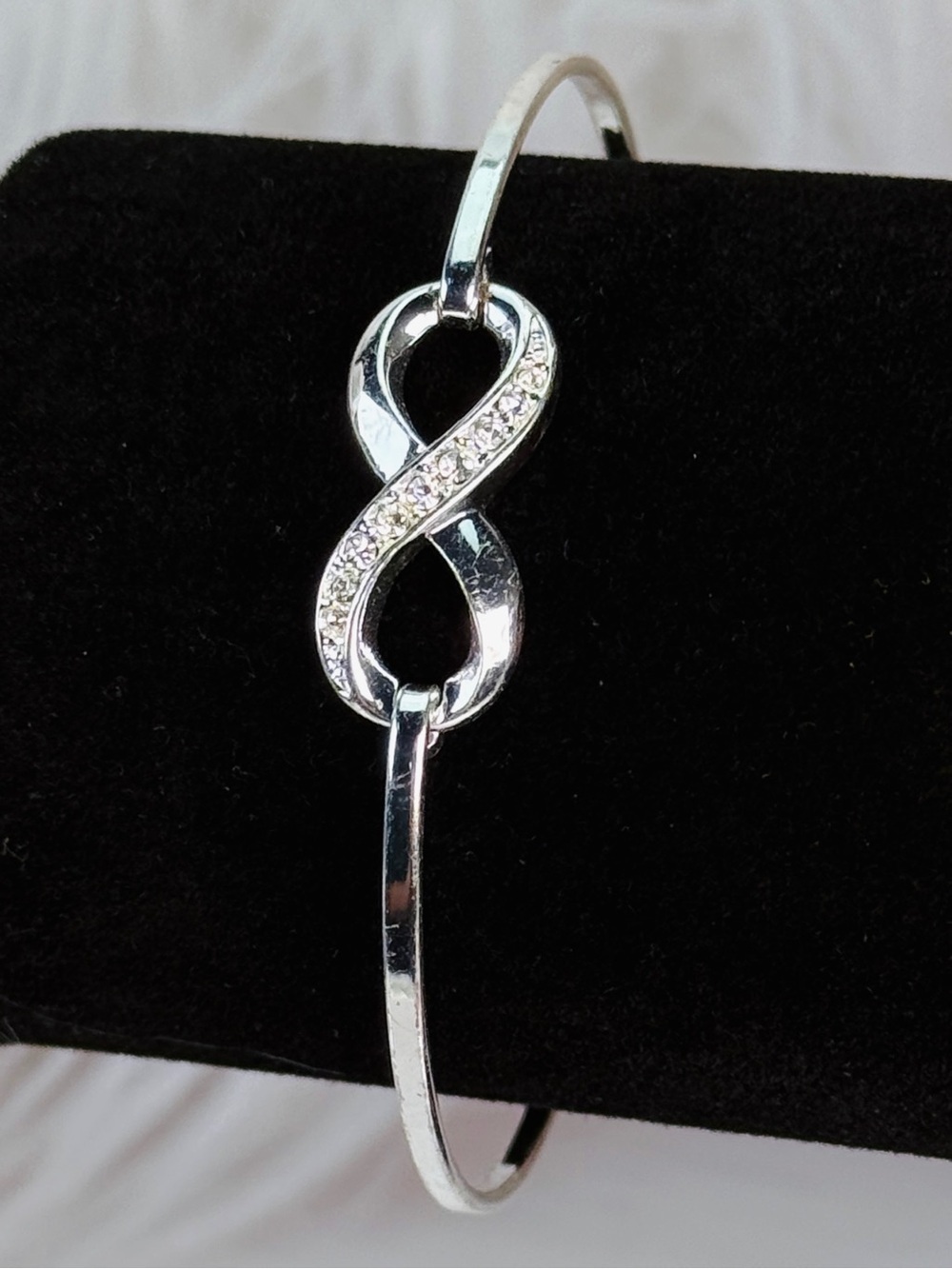 Silvertone bling accent Infinity Bracelet